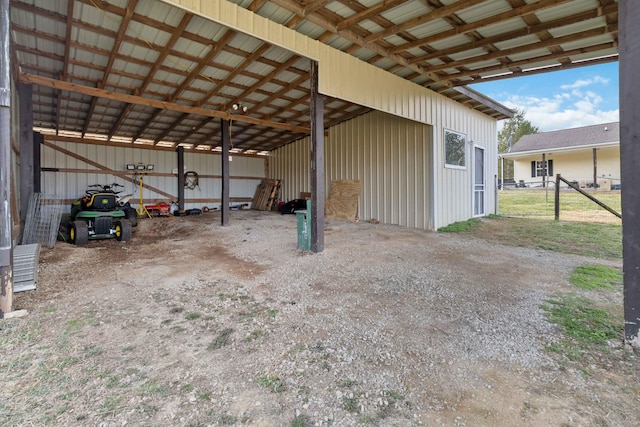 garage featuring a carport