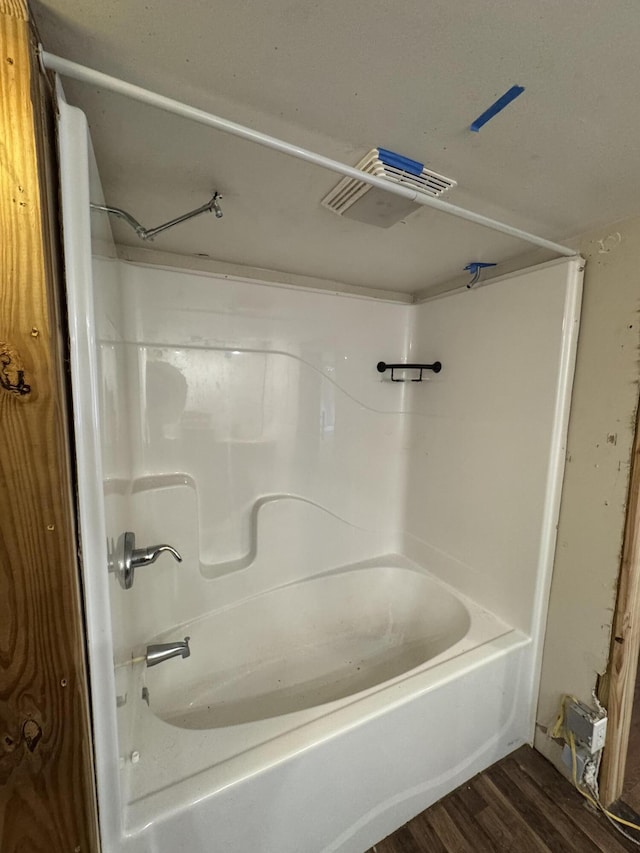 1809 Exeter Ave, Middlesboro, KY 40965 - full bathroom with  shower combination, wood finished floors, and visible vents