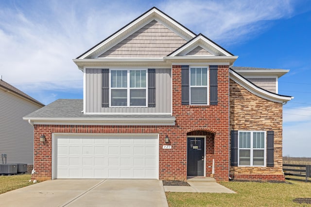 view of front facade with concrete driveway, brick siding, board and batten siding, and a front lawn