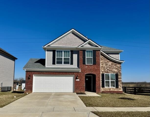 view of front of property featuring brick siding, an attached garage, fence, central AC unit, and driveway