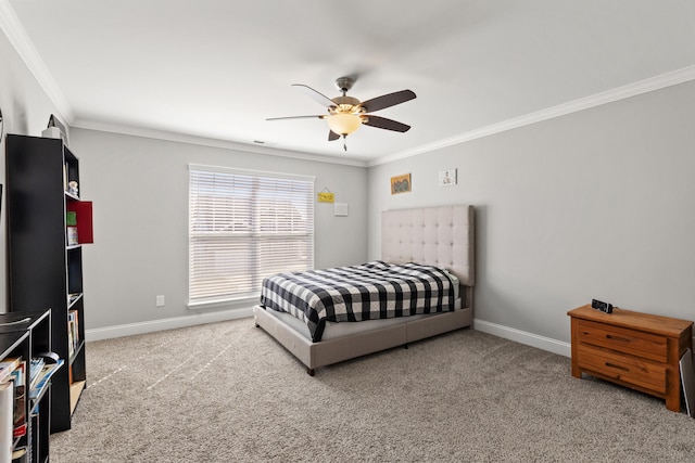 bedroom with carpet flooring, ceiling fan, baseboards, and ornamental molding