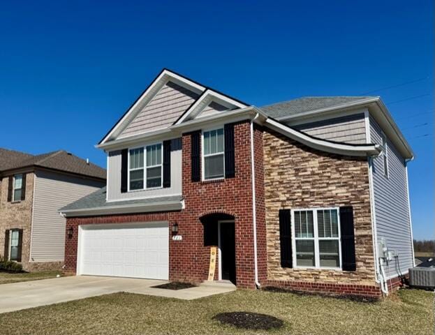 view of front facade featuring cooling unit, driveway, and a garage