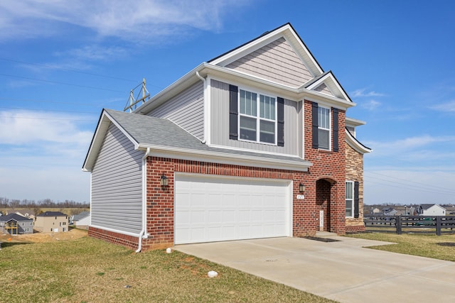 view of front of home with brick siding, an attached garage, fence, a front yard, and driveway