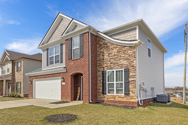 view of front facade with a front yard, an attached garage, central AC, a shingled roof, and concrete driveway