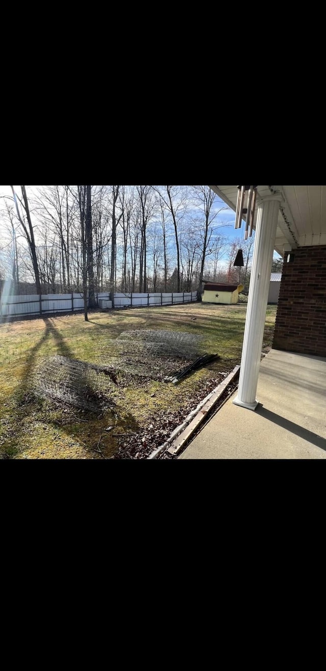 view of yard featuring fence