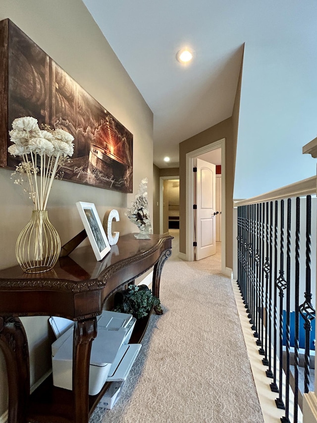 carpeted office featuring baseboards