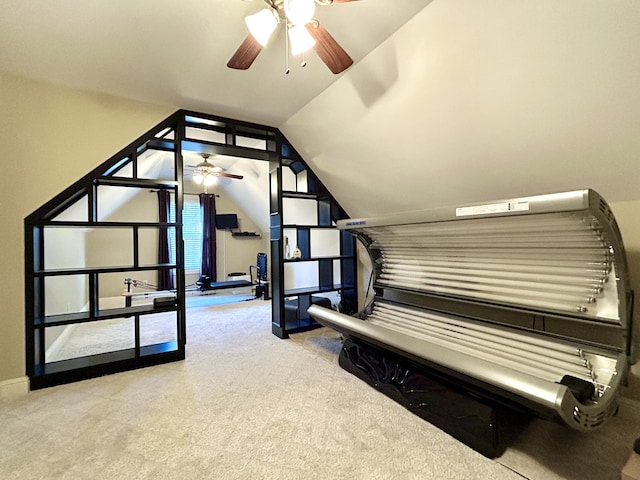 bonus room featuring lofted ceiling, carpet, and baseboards