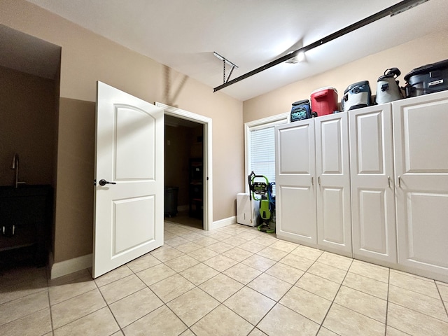 garage with baseboards