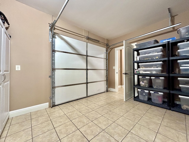 garage featuring baseboards