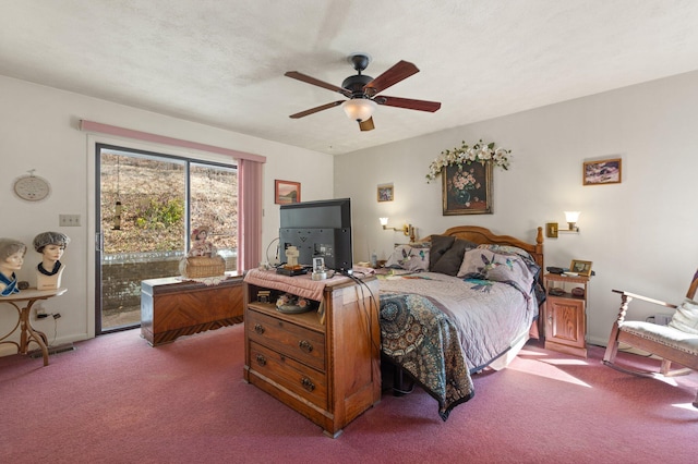 carpeted bedroom with access to exterior, a textured ceiling, baseboards, and a ceiling fan