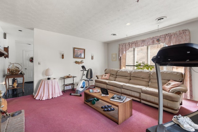 carpeted living room featuring a textured ceiling and visible vents