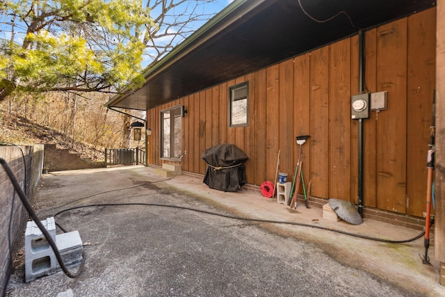 view of side of property with fence