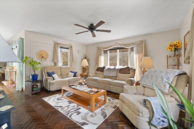 living area with ceiling fan