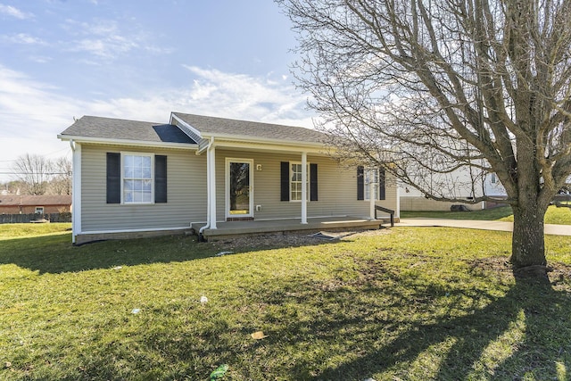 view of front of property featuring a porch and a front lawn