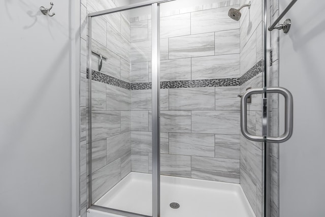 full bathroom featuring a stall shower