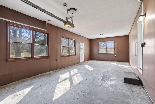 interior space with unfinished concrete floors