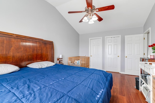 bedroom featuring lofted ceiling, ceiling fan, baseboards, and wood finished floors