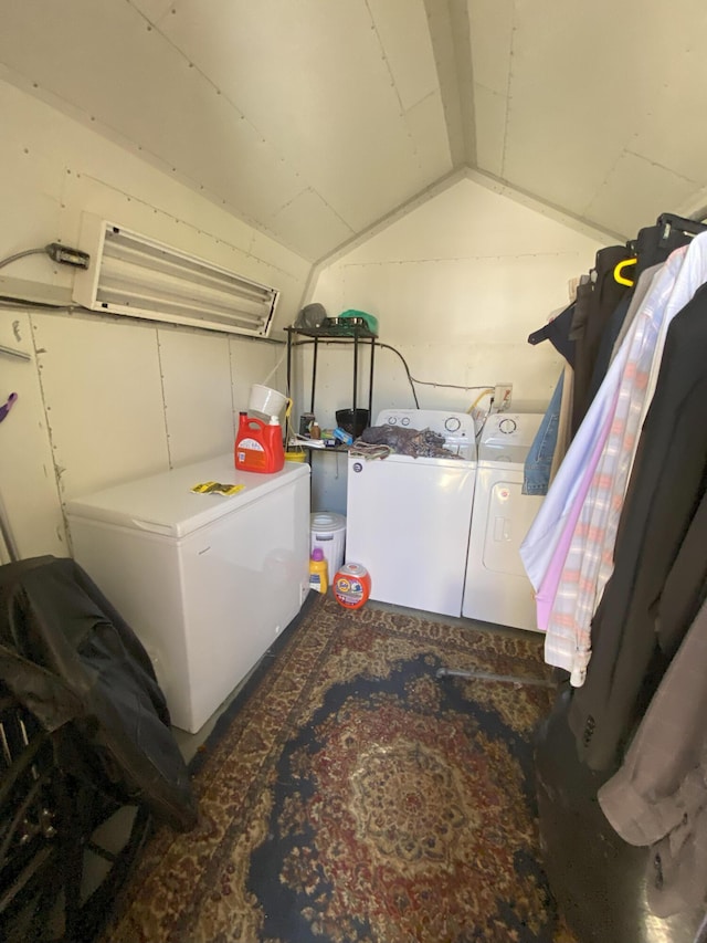 laundry area featuring laundry area and washer and clothes dryer