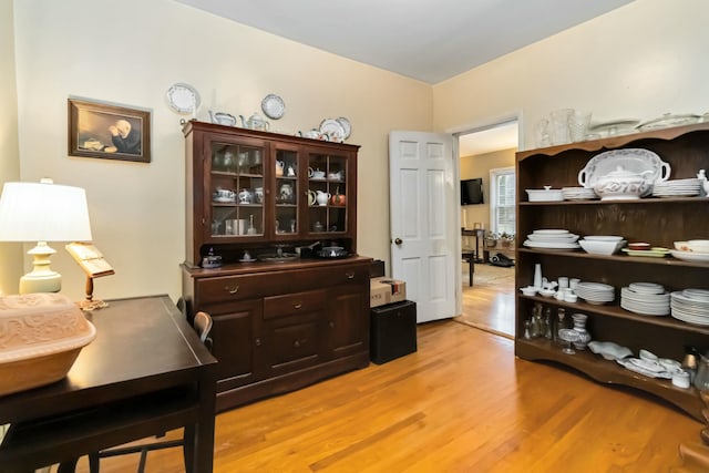 home office featuring light wood-style flooring