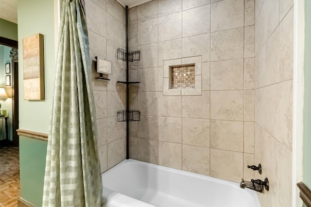 bathroom featuring shower / bath combination with curtain