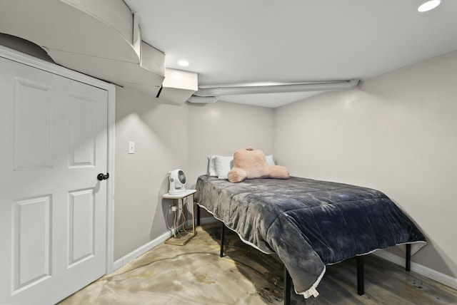 bedroom featuring recessed lighting and baseboards