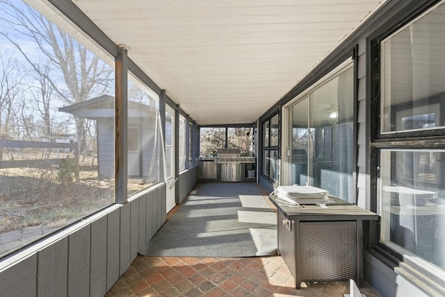 sunroom / solarium with plenty of natural light