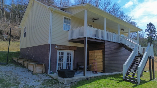 back of house featuring ceiling fan, french doors, stairway, and a patio area