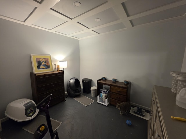 miscellaneous room featuring coffered ceiling and concrete floors