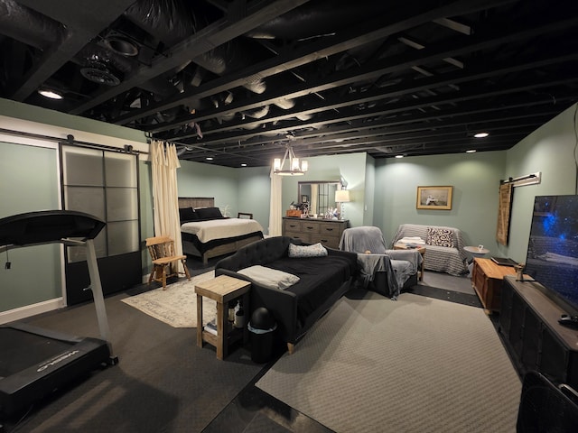 interior space with carpet floors and a barn door