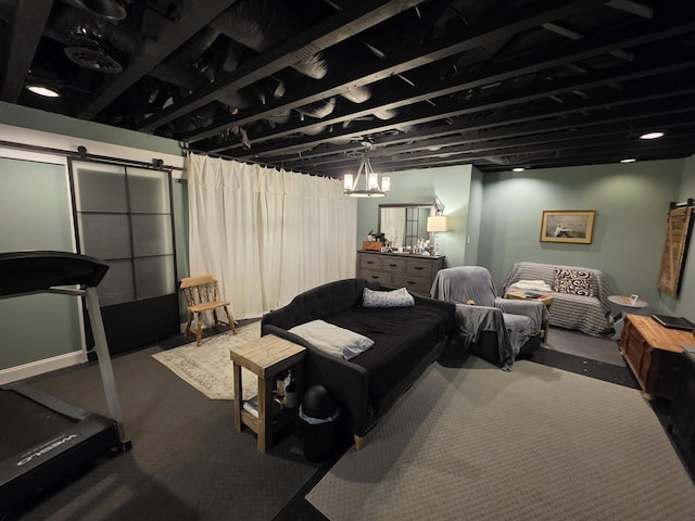 interior space featuring carpet flooring and a barn door