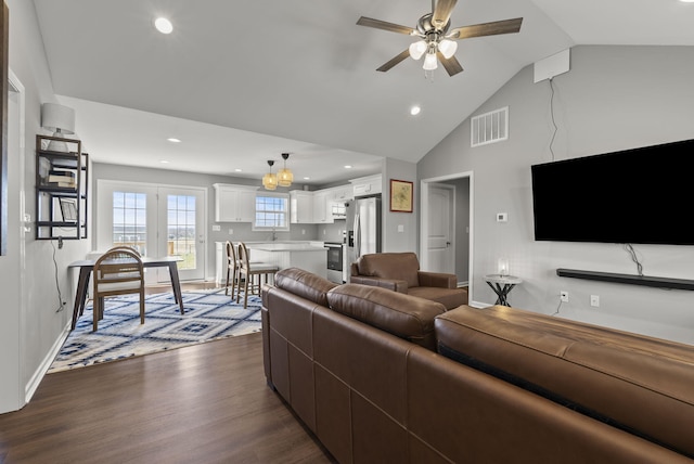 living area with ceiling fan, recessed lighting, visible vents, baseboards, and dark wood finished floors