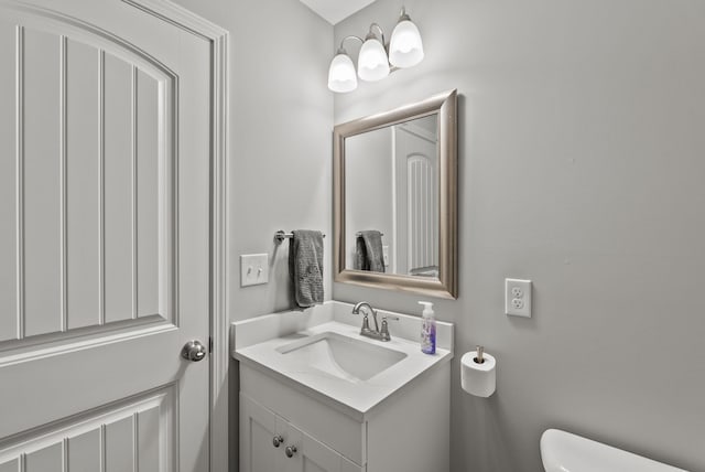 half bath with toilet and vanity