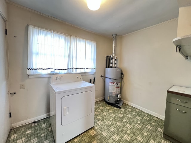 laundry room with water heater, laundry area, washer / clothes dryer, and baseboards