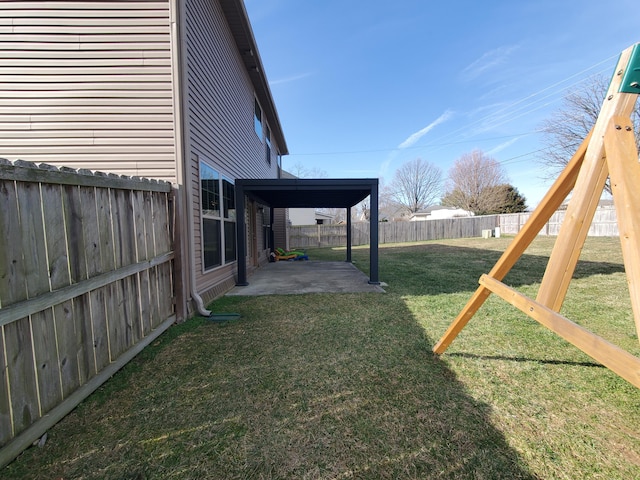 view of yard featuring a patio and a fenced backyard