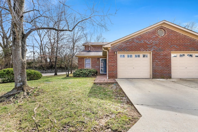 view of front of property with a garage, concrete driveway, brick siding, and a front lawn