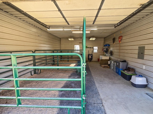 view of horse barn with electric panel