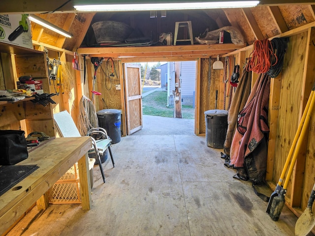 garage featuring a workshop area