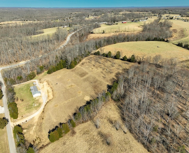 birds eye view of property featuring a rural view