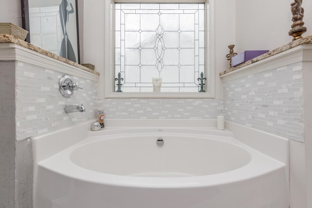 full bath with a garden tub