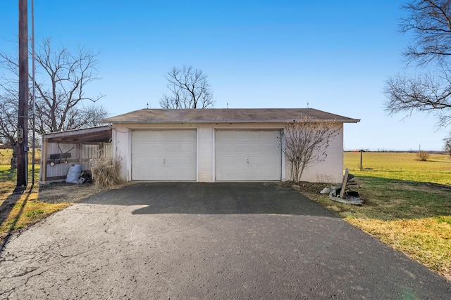 garage with driveway