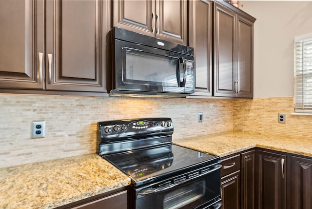 kitchen with decorative backsplash, dark brown cabinetry, and black appliances