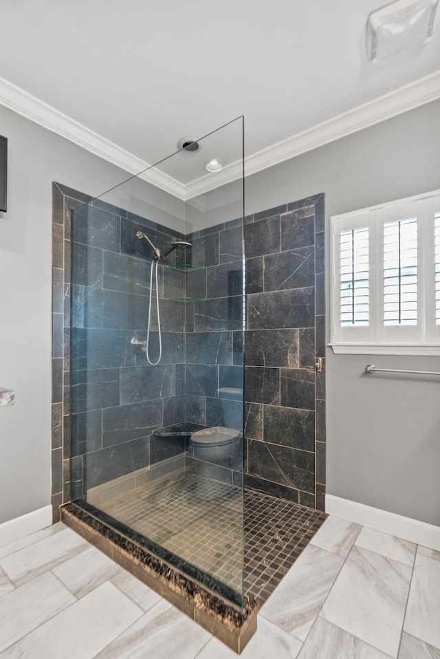 full bathroom featuring crown molding, a walk in shower, and baseboards