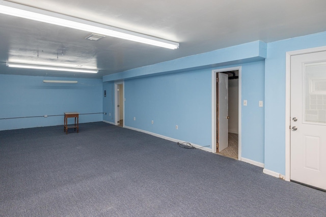 finished basement featuring carpet and baseboards