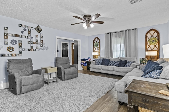 4200 Grays Run Pike, Cynthiana, KY 41031 - living room with wood finished floors, a ceiling fan, and a textured ceiling