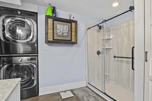 4200 Grays Run Pike, Cynthiana, KY 41031 - washroom with laundry area, wood finished floors, baseboards, and stacked washer and dryer