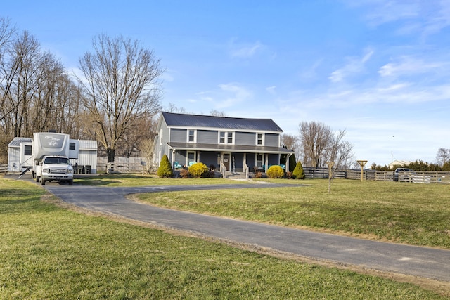 4200 Grays Run Pike, Cynthiana, KY 41031 - view of front of property featuring a front lawn, aphalt driveway, fence, covered porch, and metal roof