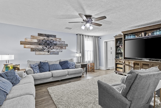 4200 Grays Run Pike, Cynthiana, KY 41031 - living room featuring visible vents, a textured ceiling, a ceiling fan, and wood finished floors