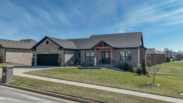 view of front of house featuring a garage, brick siding, concrete driveway, roof with shingles, and a front lawn