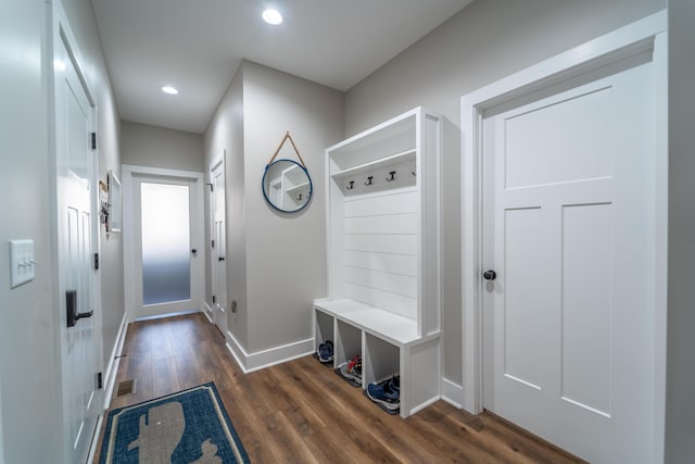 mudroom with recessed lighting, dark wood-style flooring, visible vents, and baseboards