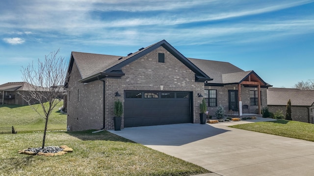 view of front of home with a garage, driveway, roof with shingles, a front lawn, and brick siding